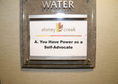 This photograph depicts a the breakout session title "You Have Power as a Self-Advocate" written on a label that has been placed on the outside of the session's location